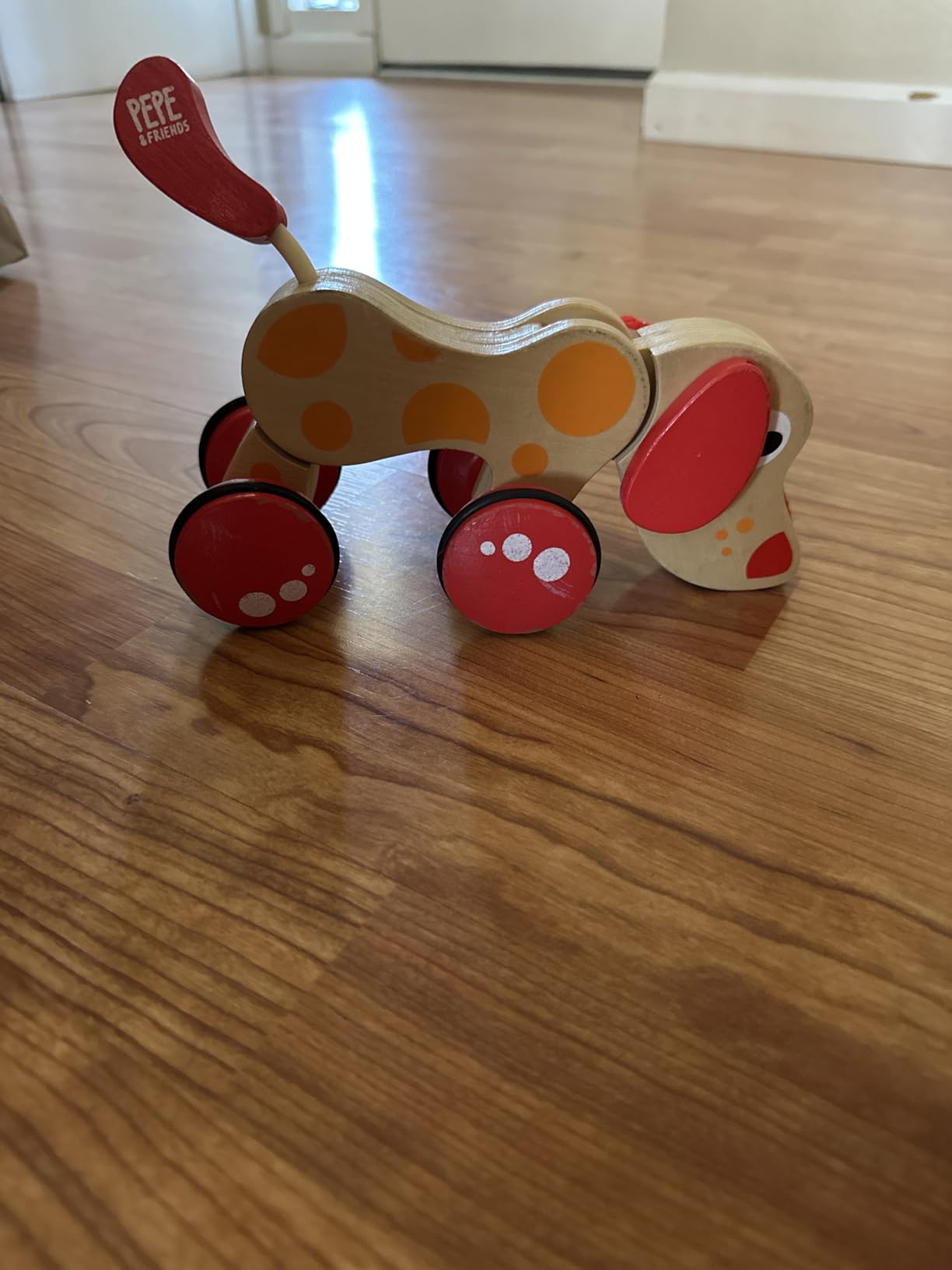 Hape Walk-A-Long Puppy Wooden Pull Toy customer photo 1