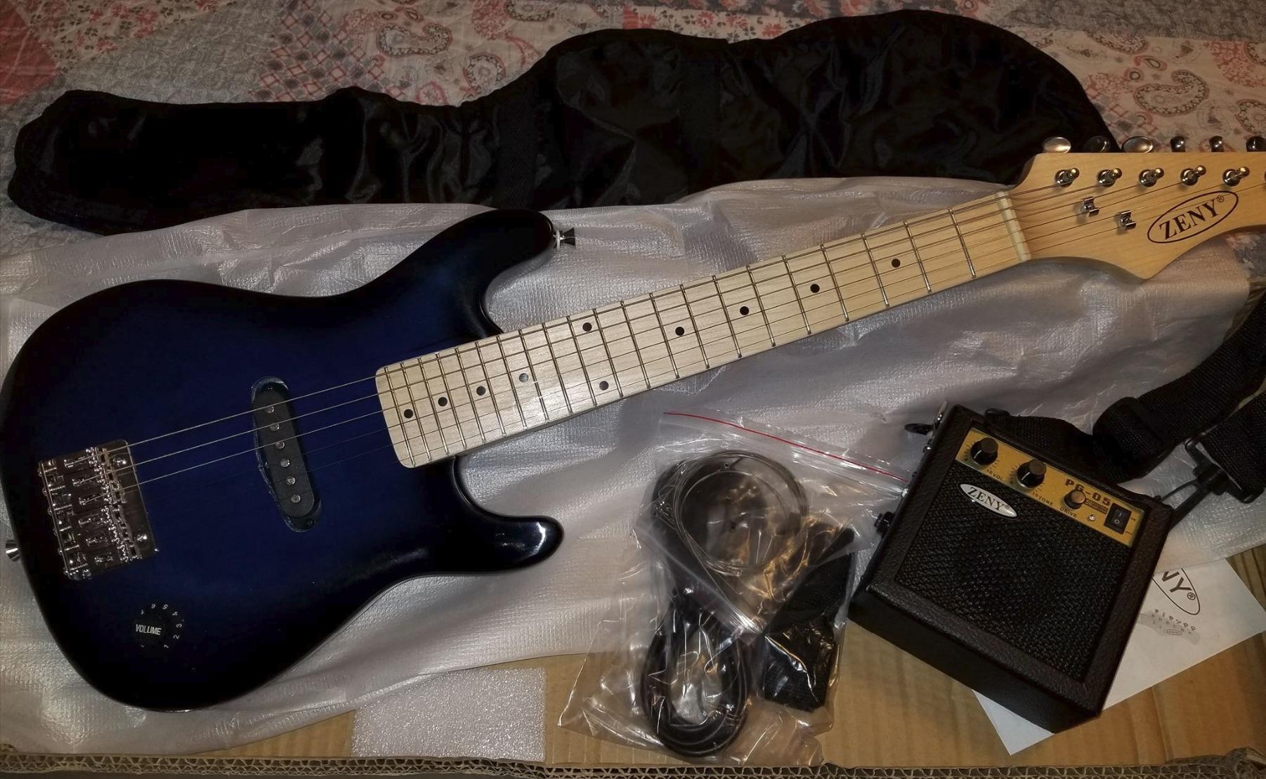 30 Inch Electric Guitar, Starter Kit for Kids with Amplifier,Picks, Gig Bag, Shoulder Strap, Cable & Accessory Kit,Solid Wood Body, Blue customer photo 2