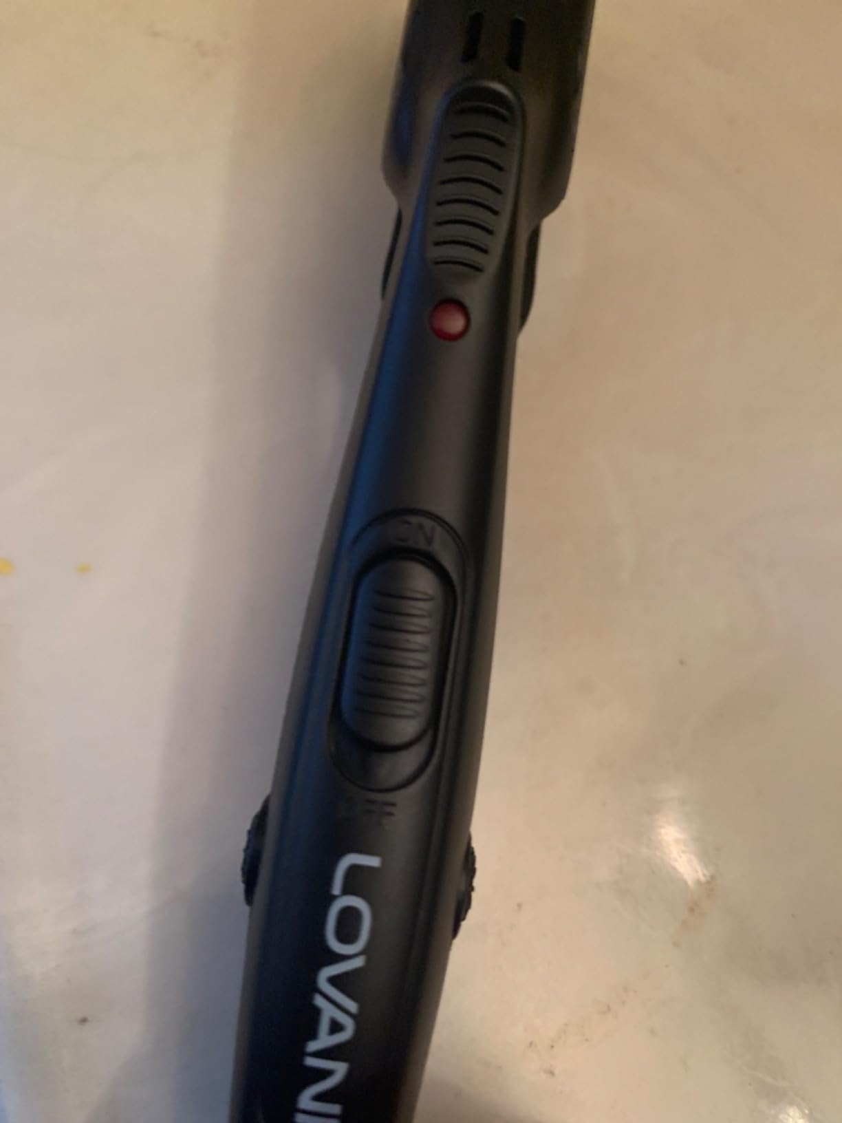 LOVANI Mini Flat Iron 0.5 inch, Dual Voltage Travel Hair Straightener for Short to Medium Hair & Bangs, Small Size Ceramic Tourmaline 3D Floating Plates, Heat‑Resistant Pouch Included customer photo 2