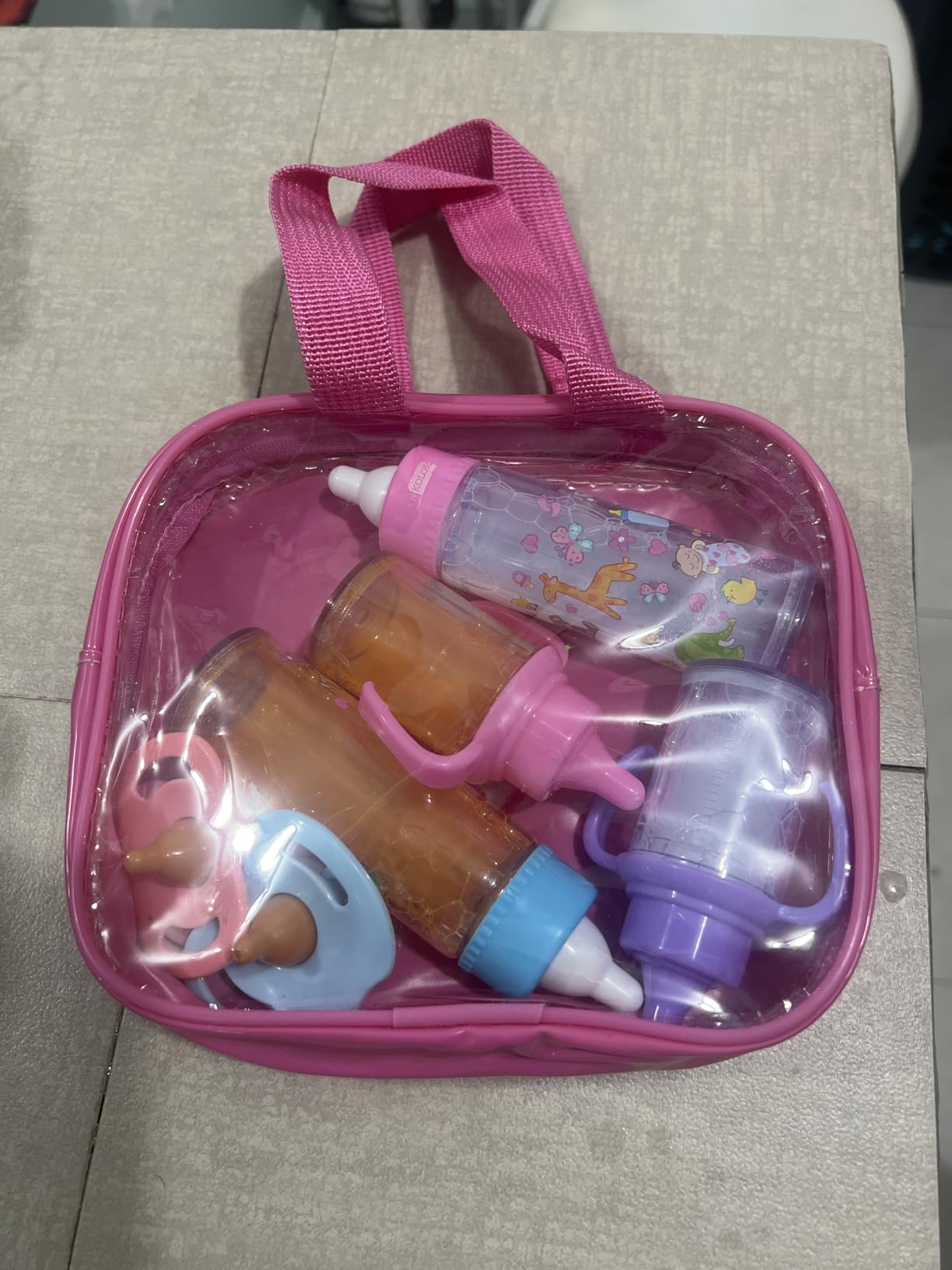 fash n kolor® My Sweet Baby Disappearing Doll Feeding Set, Baby Care 6 Piece Doll Feeding Set - for Toy Stroller | 2 Milk & Juice Bottles with 2 Toy Pacifier for Baby Dolls Set - Kids Gift Set customer photo 2