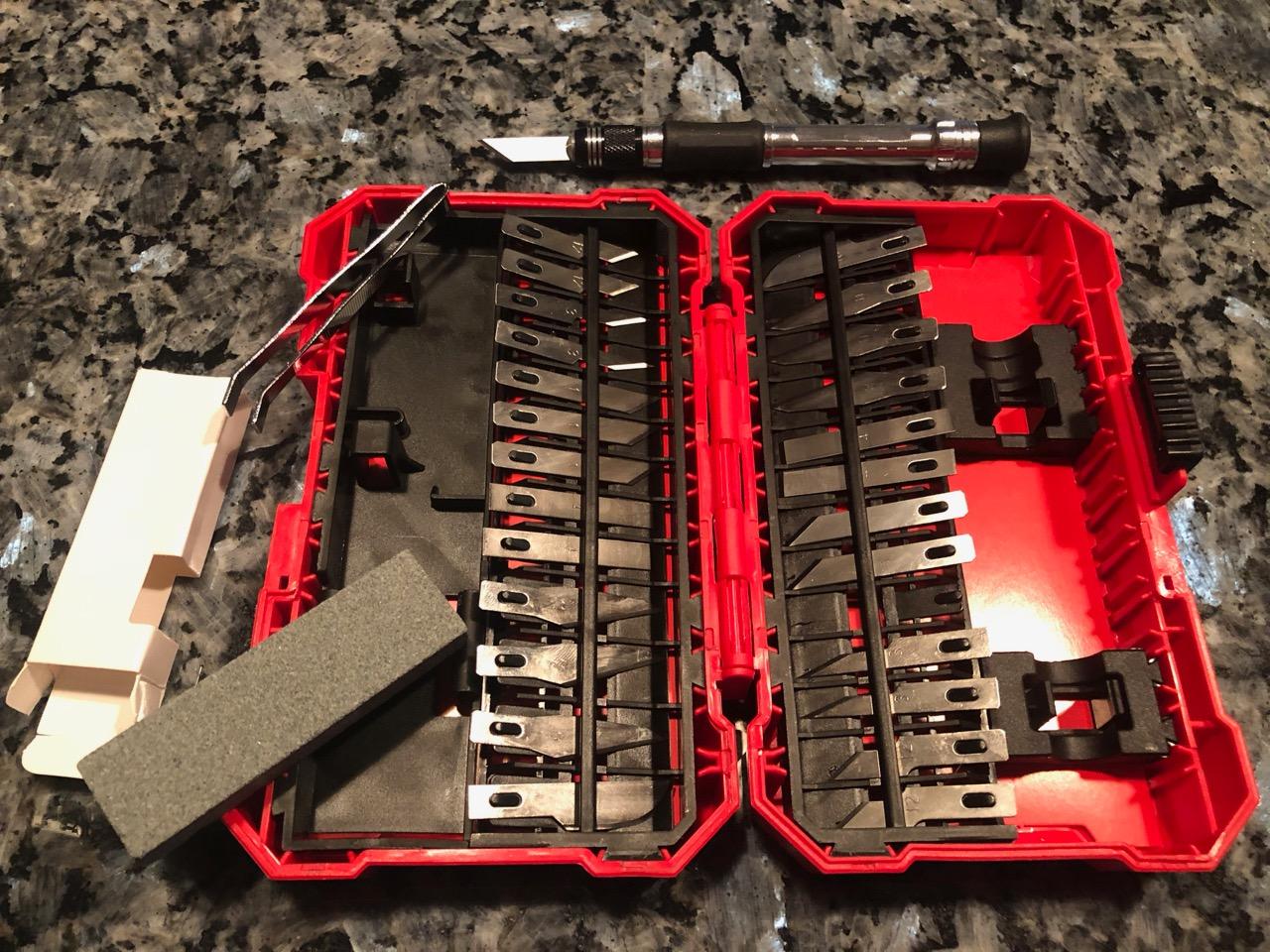 Amazon Basics 29-Piece Precision Hobby Knife Set with Razor-Sharp Blades, Modeling Tools, Anti-Slip Rubber Grip, Black, Silver, Red customer photo 1