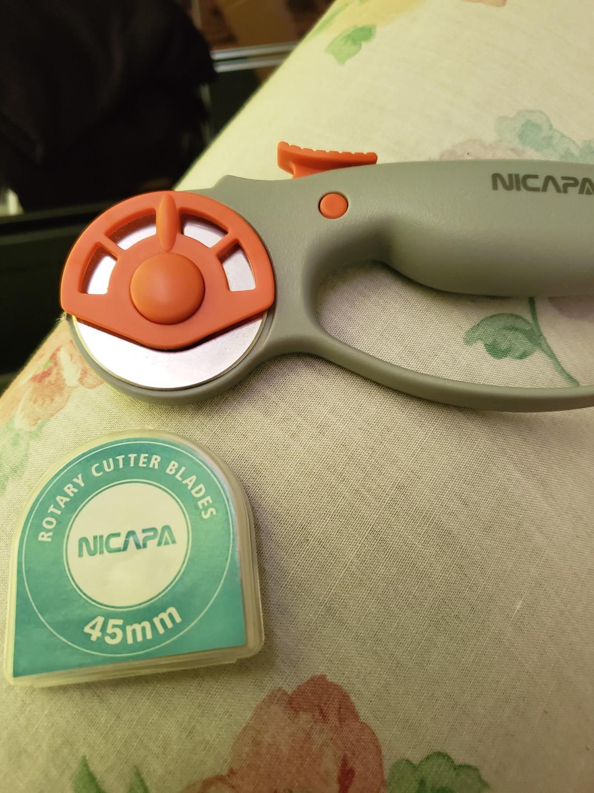NICAPA 45mm Rotary Cutter for Fabric with Safety Lock Ergonomic Classic Comfort Loop Rotary Cutter for Crafting Sewing Quilting (Extra 5pcs 45mm Replacement Blades Included) customer photo 2