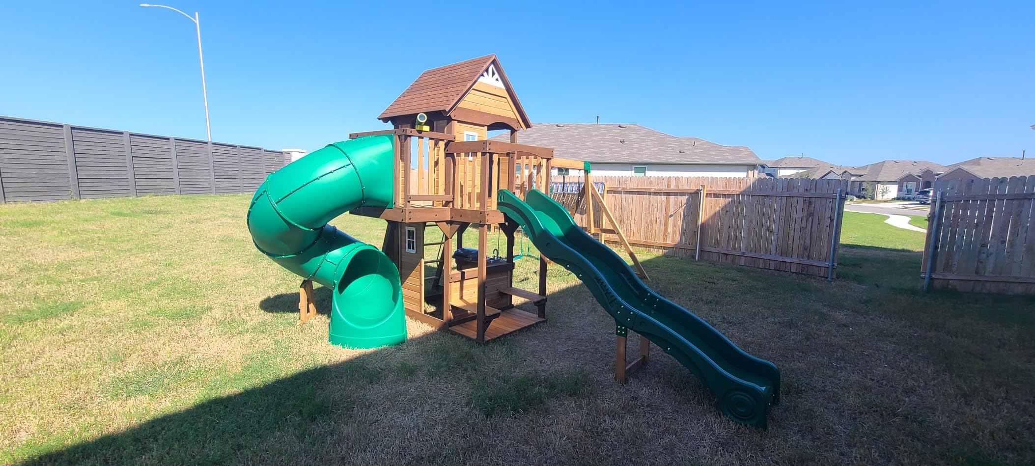 Cedar Cove Cedar Wood Swing Set with Spiral Tube Slide, Wave Slide, Clubhouse, Toy Grill, Snack Bar, Rock Wall, Belt Swings, Web Swing, Balcony, Chalkboard, Ladder, Outdoor Playset customer photo 2