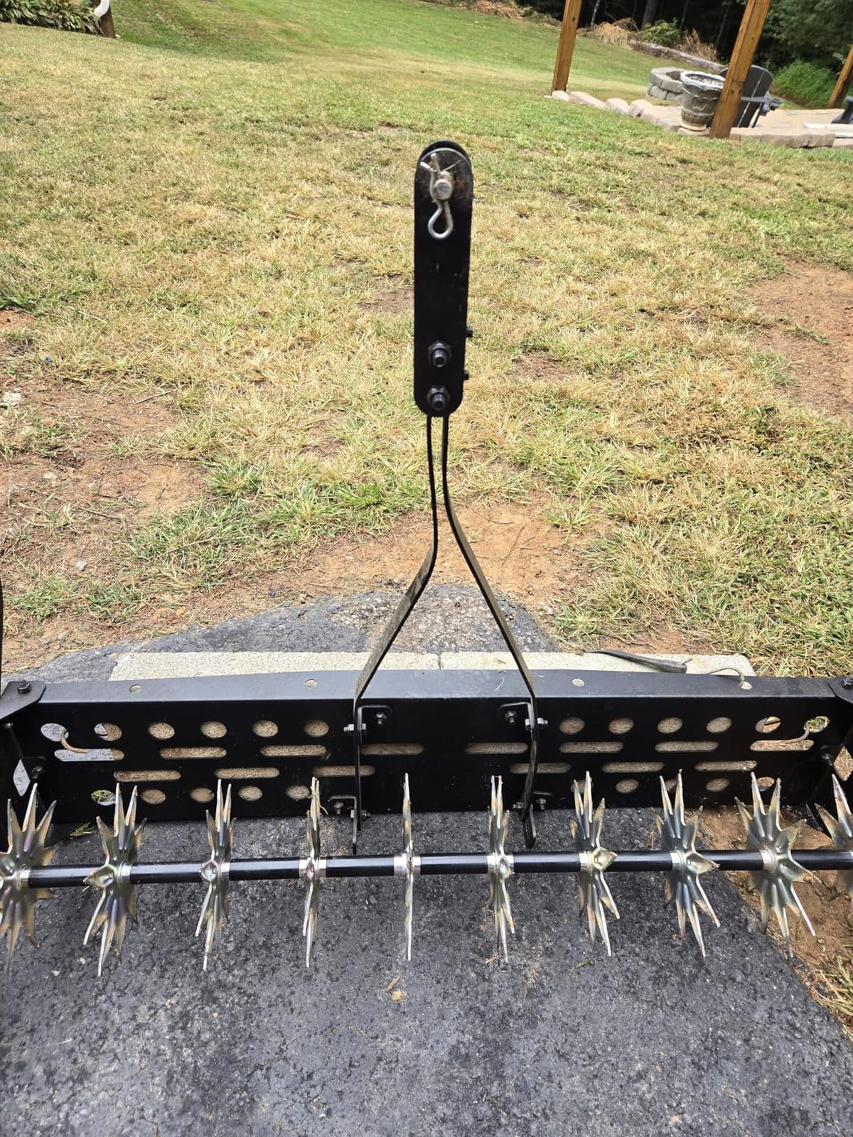 Suchtale 40-Inch Tow Behind Spike Aerator with Galvanized Steel Tines, Durable Lawn Aerator Soil Penetrator Spikes Tractor with Extra-Wide Tow Bar for Lawn and Farm, Black customer photo 1