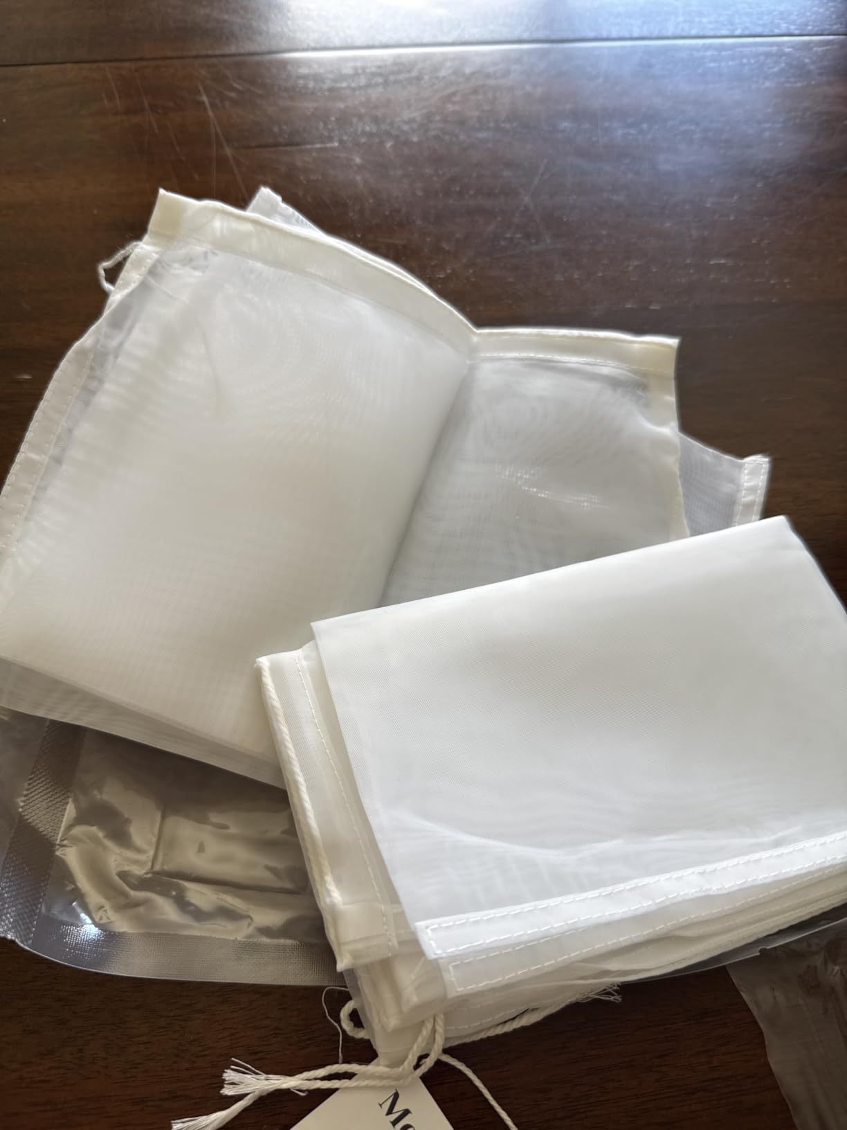 WLLHYF 4 Pack Nylon Nut Milk Bag 8 × 12 Inches Fine Mesh Cheese Cloth Multiple Usage Reusable Food Strainer Professional Cold Brew Filter for Straining Juice Coffee Yogurt Tea (Nylon, 12×8 In) customer photo 1