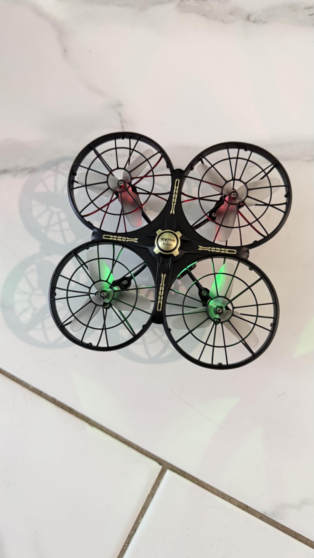 SYMA X100 Indoor Drone for Kids 8-12, Obstacle Avoidance, Full Guard | 20-Min Flight with 2 Batteries, One-key 360° Flips, Altitude Hold and Full Propeller Guard for Safe Indoor Flying customer photo 2