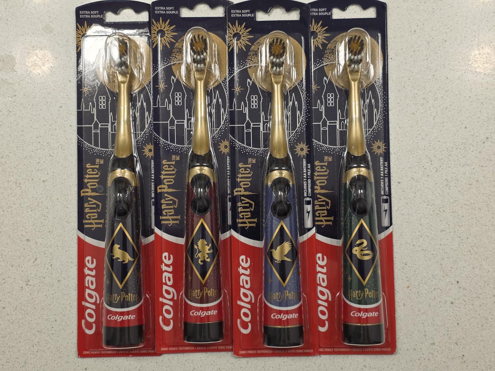 Colgate Kids Harry Potter Battery Electric Toothbrush, Extra Soft, 4 Pack | Vibrating Battery Powered Toothbrushes, Includes 4 AA Batteries, 4 Unique House Designs, Easy On/Off Button, Slim Handle customer photo 1