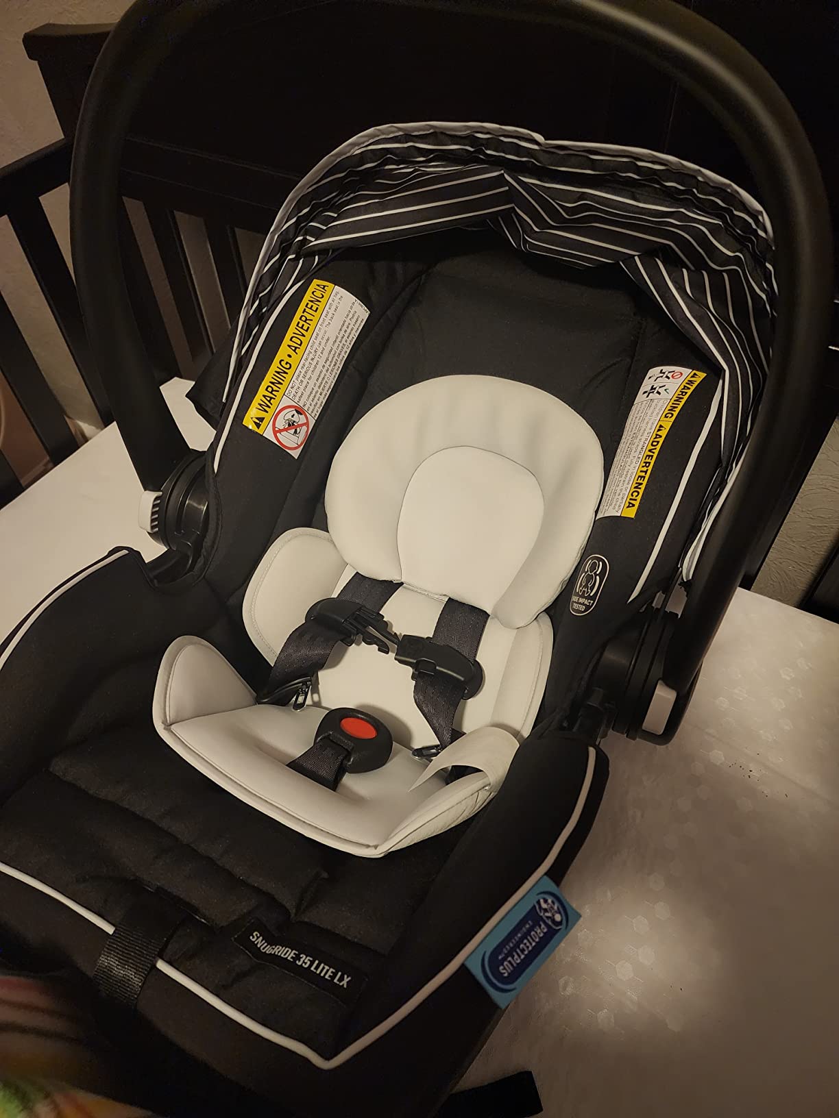 Graco SnugRide Lite LX Infant Car Seat, Lightweight Rear-Facing Seat for Babies 4–30 lb, 4-Position Adjustable Base, Latch Installation & ProtectPlus Engineered, Lilac Mod customer photo 1
