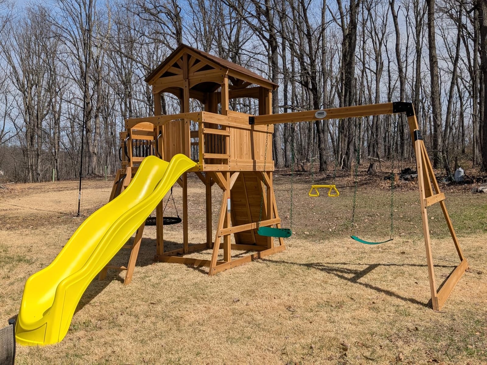 Backyard Discovery Dover Bay Spruce Wood Swing Set with Spiral Tube Slide, Wave Slide, Clubhouse, Rock Wall, Belt Swings, Step Ladder, Toy Telescope, Chalkboard, Outdoor Playset customer photo 1