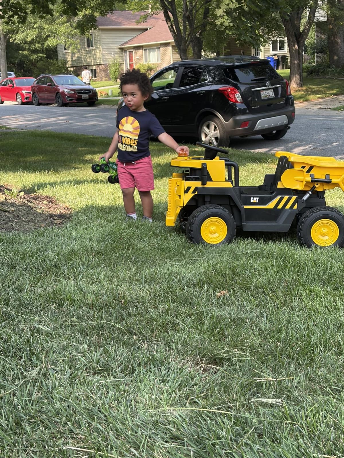 Licensed Caterpillar 24V Ride On Dump Truck w/Remote Control, 4×100W Motors customer photo 1